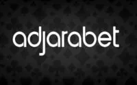 adjarabet logo on black background